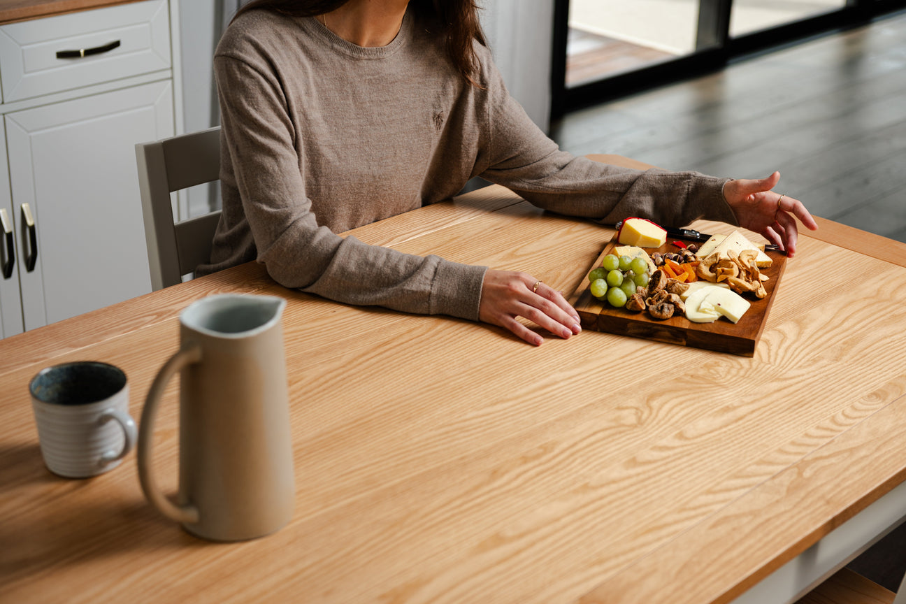 Where To Put a Wooden Dining Table Without a Dining Room?