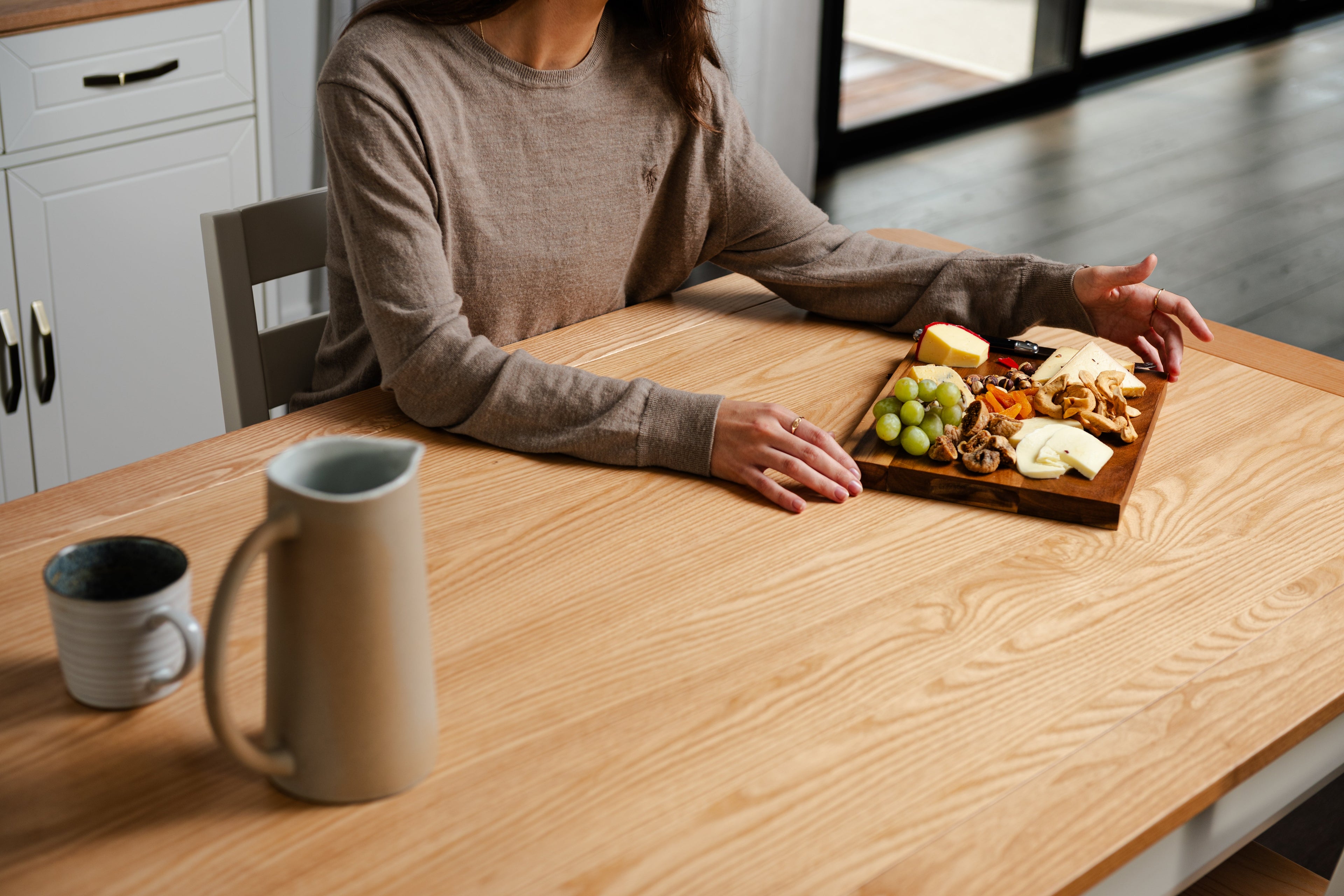 Where To Put a Wooden Dining Table Without a Dining Room?