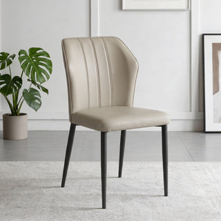 Biella beige PU dining chair set with curved backrest and sturdy black metal legs | Proferlo